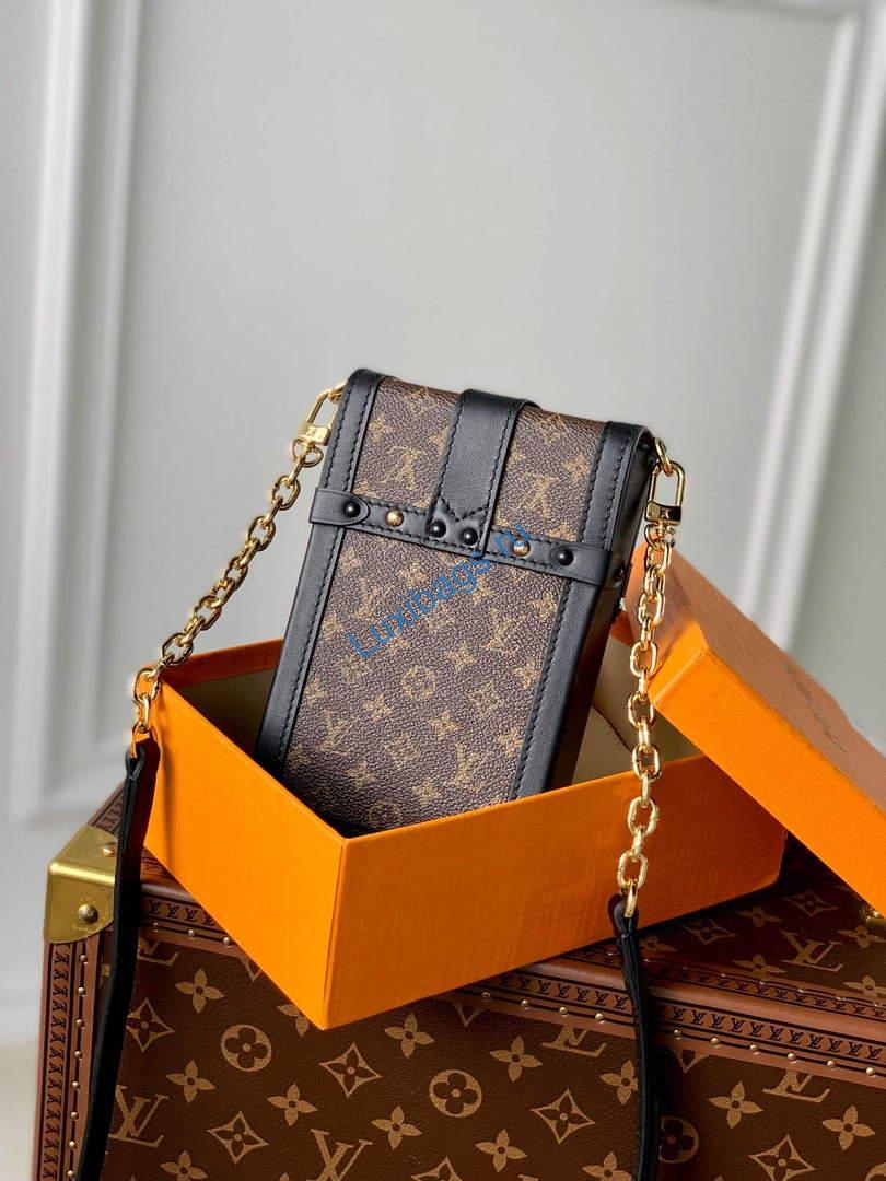 LV M63913 Louis Vuitton Vertical Trunk Pochette Bag Black | lv m63913 louis vuitton vertical trunk pochette bag 003 668206c2 2c5d 489b a016 c77966fb83a3