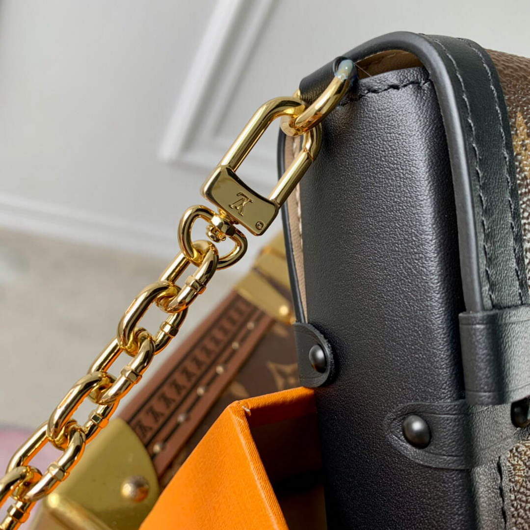 LV M63913 Louis Vuitton Vertical Trunk Pochette Bag Black | lv m63913 louis vuitton vertical trunk pochette bag 008 1e5bd8a4 a644 4e4f 990e e7a4f75e0903