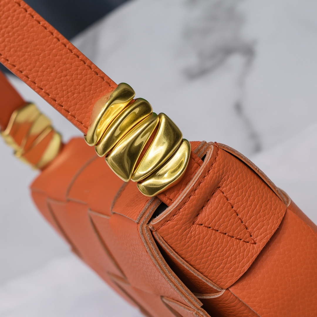 Bottega Veneta BV 666870 Cassette Intreccio grained leather cross-body bag Orange | bottega veneta bv 666870 cassette intreccio grained leather cross body bag orange 007