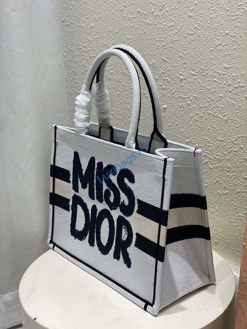 Dior M1296 Medium Dior Book Tote White and Blue Miss Dior Graffiti Embroidery | dior m1296 medium dior book tote white and blue miss dior graffiti embroidery 1 002