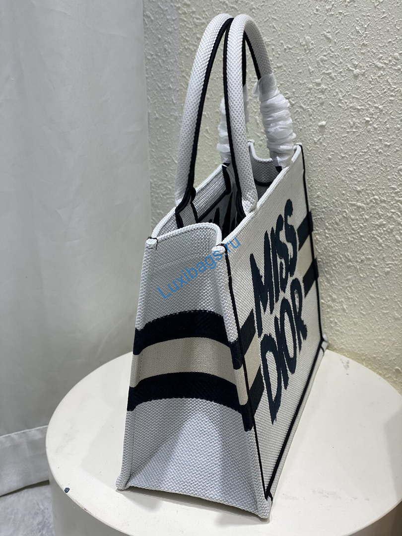 Dior M1296 Medium Dior Book Tote White and Blue Miss Dior Graffiti Embroidery | dior m1296 medium dior book tote white and blue miss dior graffiti embroidery 1 003