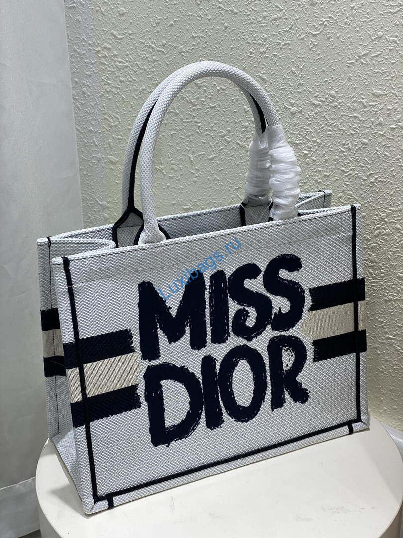Dior M1296 Medium Dior Book Tote White and Blue Miss Dior Graffiti Embroidery | dior m1296 medium dior book tote white and blue miss dior graffiti embroidery 1 005