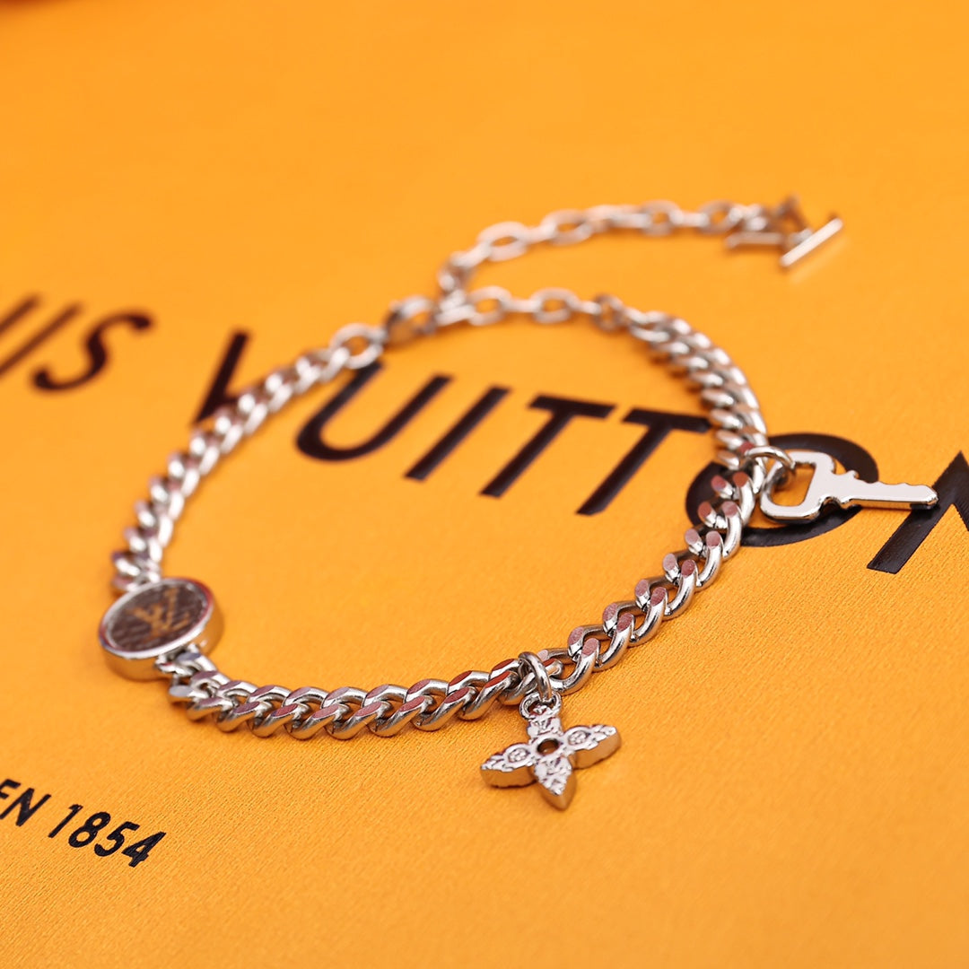 Louis Vuitton M00509 Monogram Lock bracelet | louis vuitton m00509 monogram lock bracelet 4 louis vuitton m00509 monogram lock bracelet 4