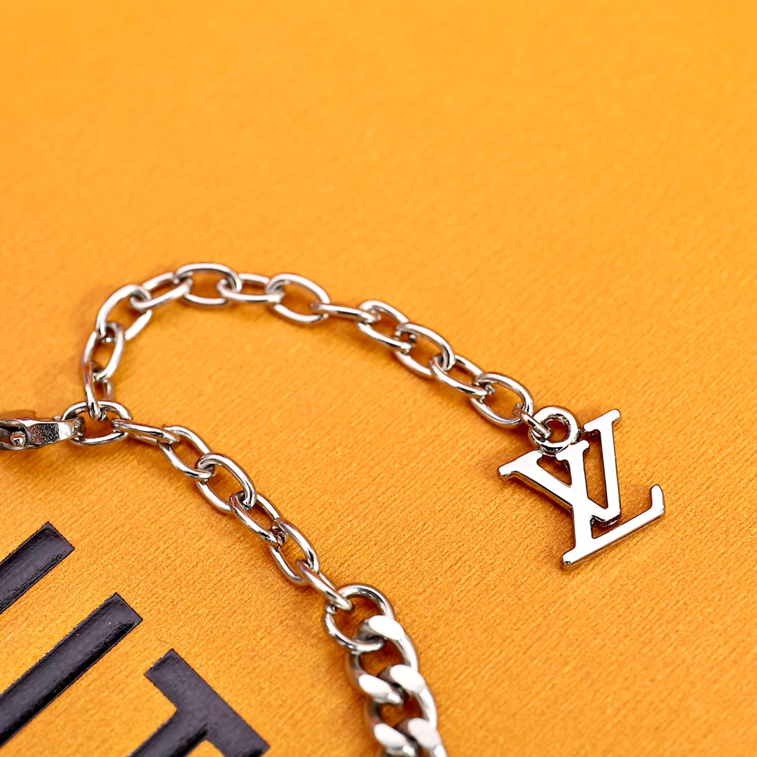 Louis Vuitton M00509 Monogram Lock bracelet | louis vuitton m00509 monogram lock bracelet 5 louis vuitton m00509 monogram lock bracelet 5