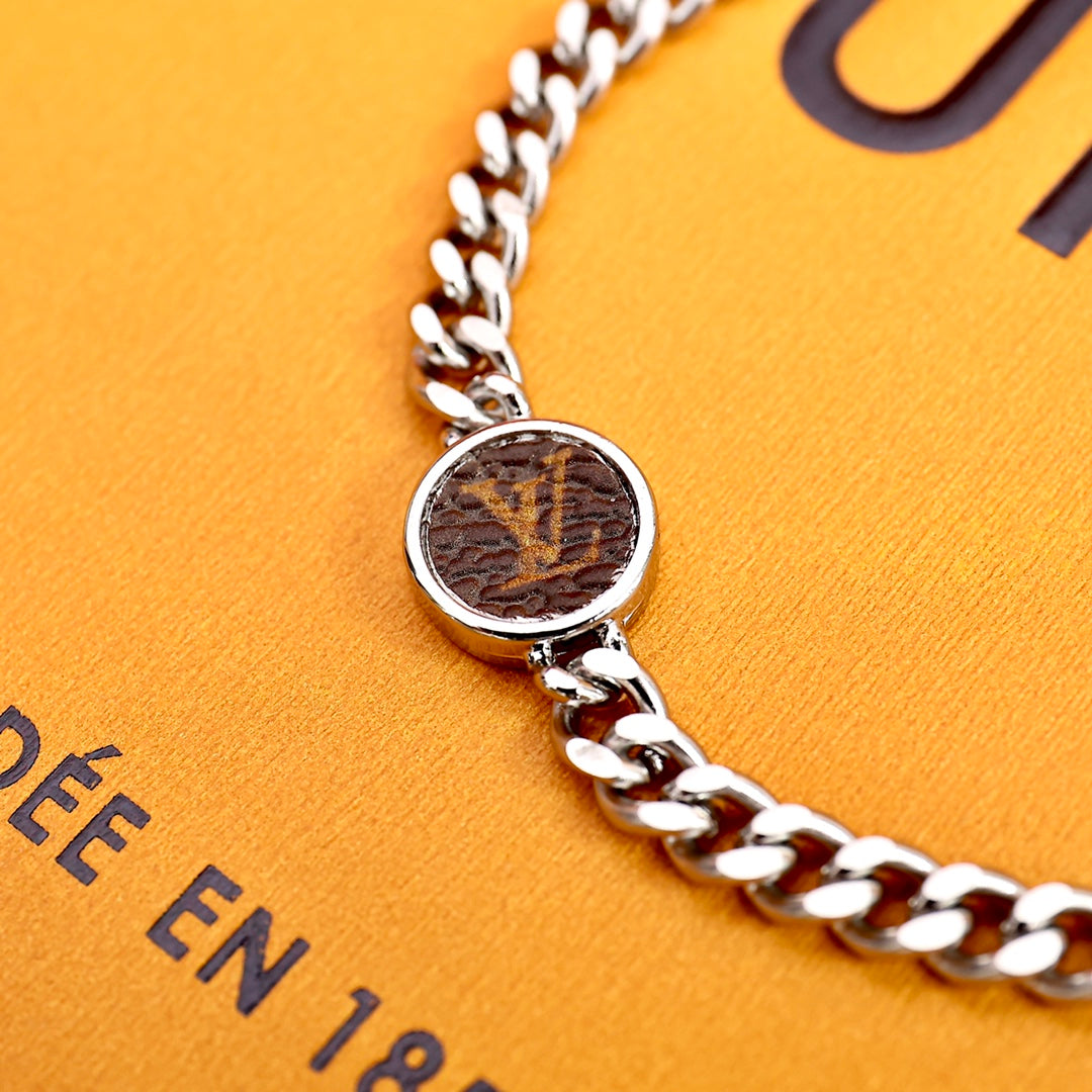 Louis Vuitton M00509 Monogram Lock bracelet | louis vuitton m00509 monogram lock bracelet 6 louis vuitton m00509 monogram lock bracelet 6