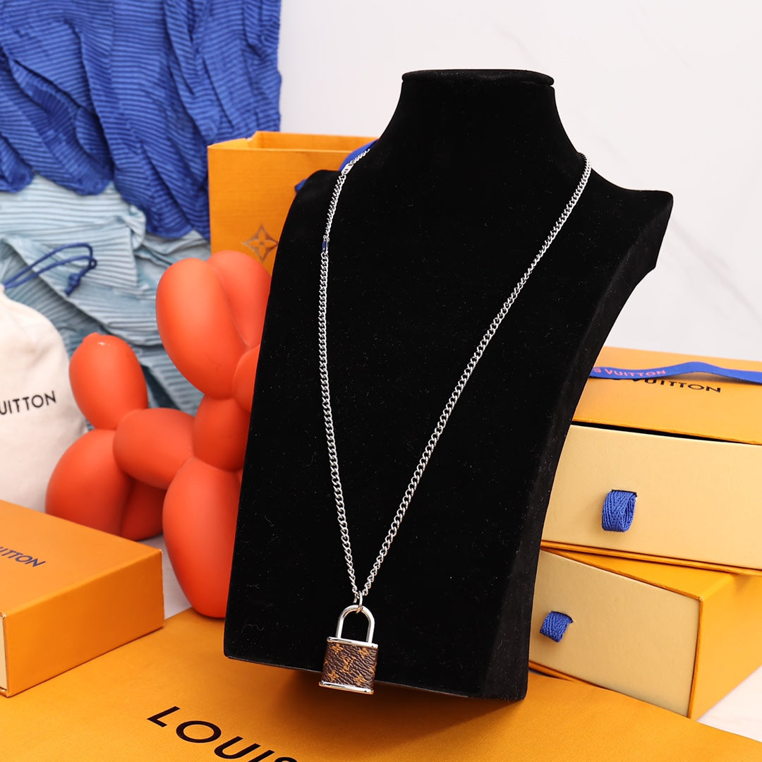 Louis Vuitton M00525 Monogram Lock Pendant | louis vuitton m00525 monogram lock pendant 10 louis vuitton m00525 monogram lock pendant 10