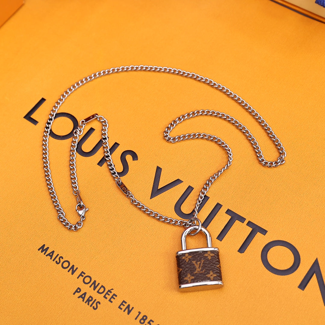 Louis Vuitton M00525 Monogram Lock Pendant | louis vuitton m00525 monogram lock pendant 2 louis vuitton m00525 monogram lock pendant 2