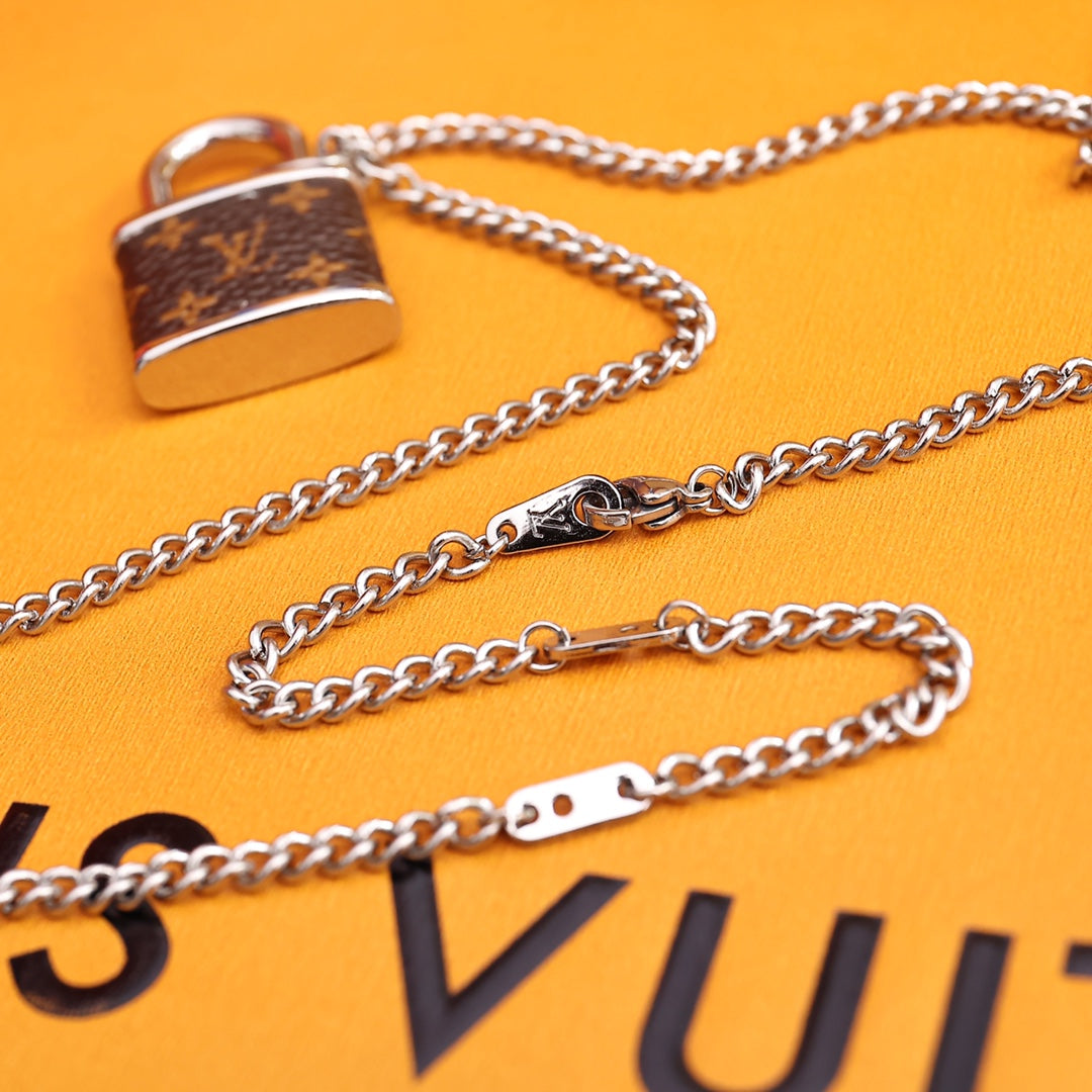 Louis Vuitton M00525 Monogram Lock Pendant | louis vuitton m00525 monogram lock pendant 5 louis vuitton m00525 monogram lock pendant 5