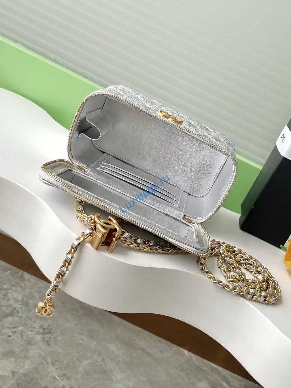 Chanel AP3940 25B Long Vanity with Chain Calfskin Gold-Tone Meta Silver | chanel ap3940 25b long vanity with chain calfskin gold tone meta 53