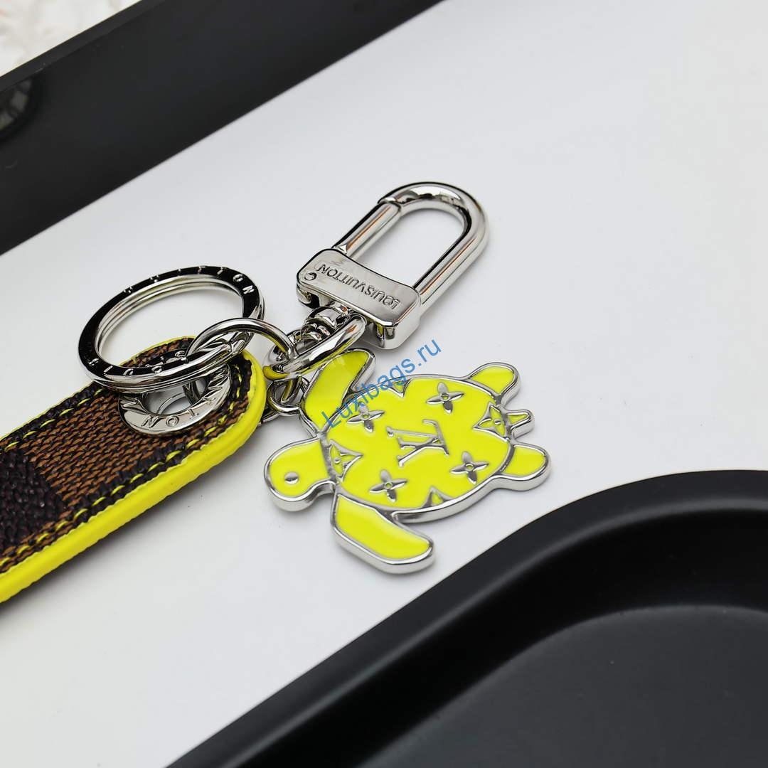 Louis Vuitton M02558 Dragonne Tab Key Holder and Bag Charm yellow | louis vuitton m02558 dragonne tab key holder and bag charm yellow 5