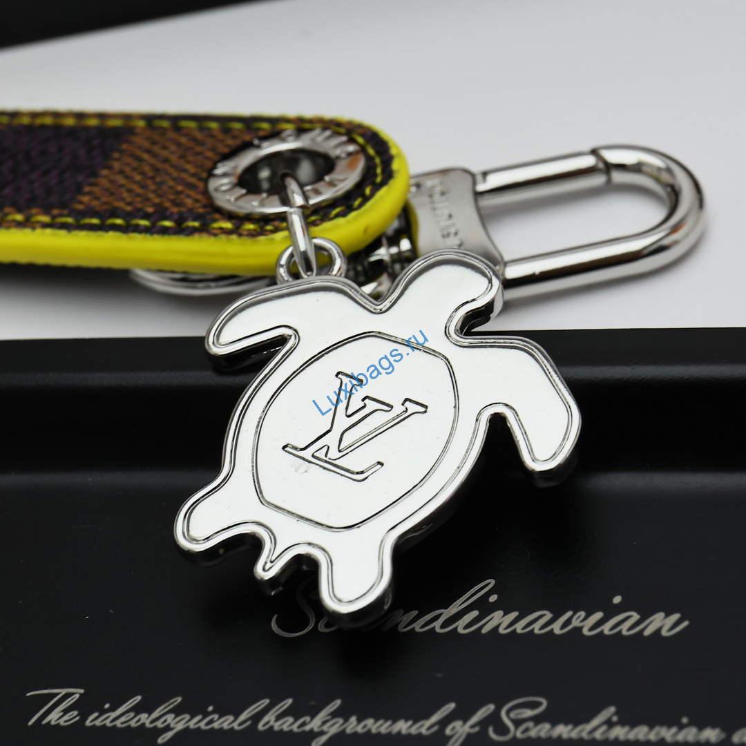 Louis Vuitton M02558 Dragonne Tab Key Holder and Bag Charm yellow | louis vuitton m02558 dragonne tab key holder and bag charm yellow 9