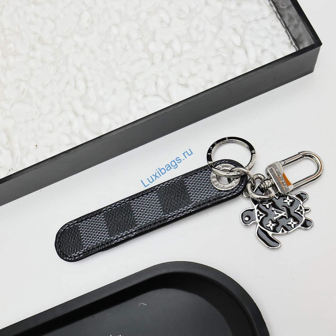 Louis Vuitton M02564 Dragonne Tab Key Holder and Bag Charm black | louis vuitton m02564 dragonne tab key holder and bag charm black 3