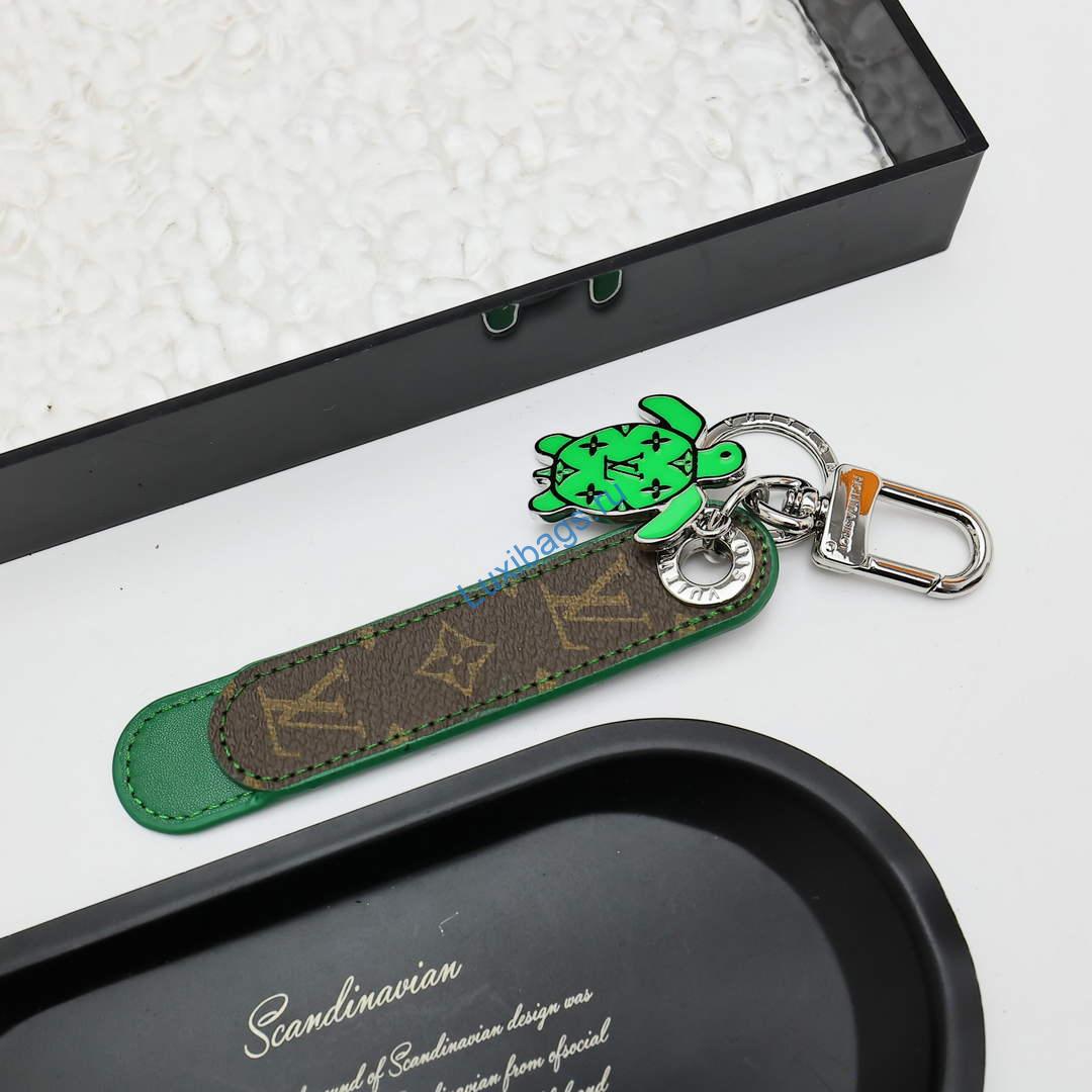 Louis Vuitton M02564 Dragonne Tab Key Holder and Bag Charm green | louis vuitton m02564 dragonne tab key holder and bag charm green 3