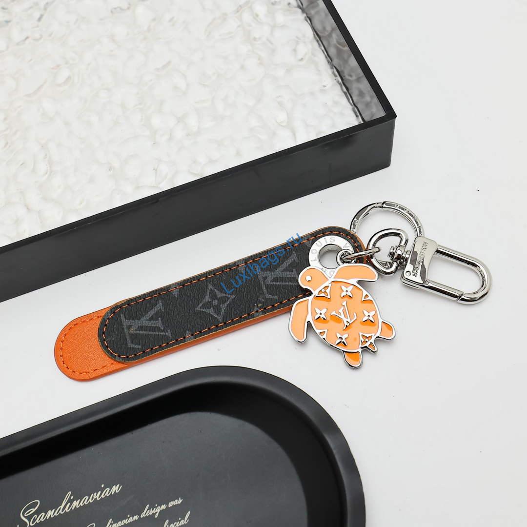 Louis Vuitton M02564 Dragonne Tab Key Holder and Bag Charm orange | louis vuitton m02564 dragonne tab key holder and bag charm orange 2
