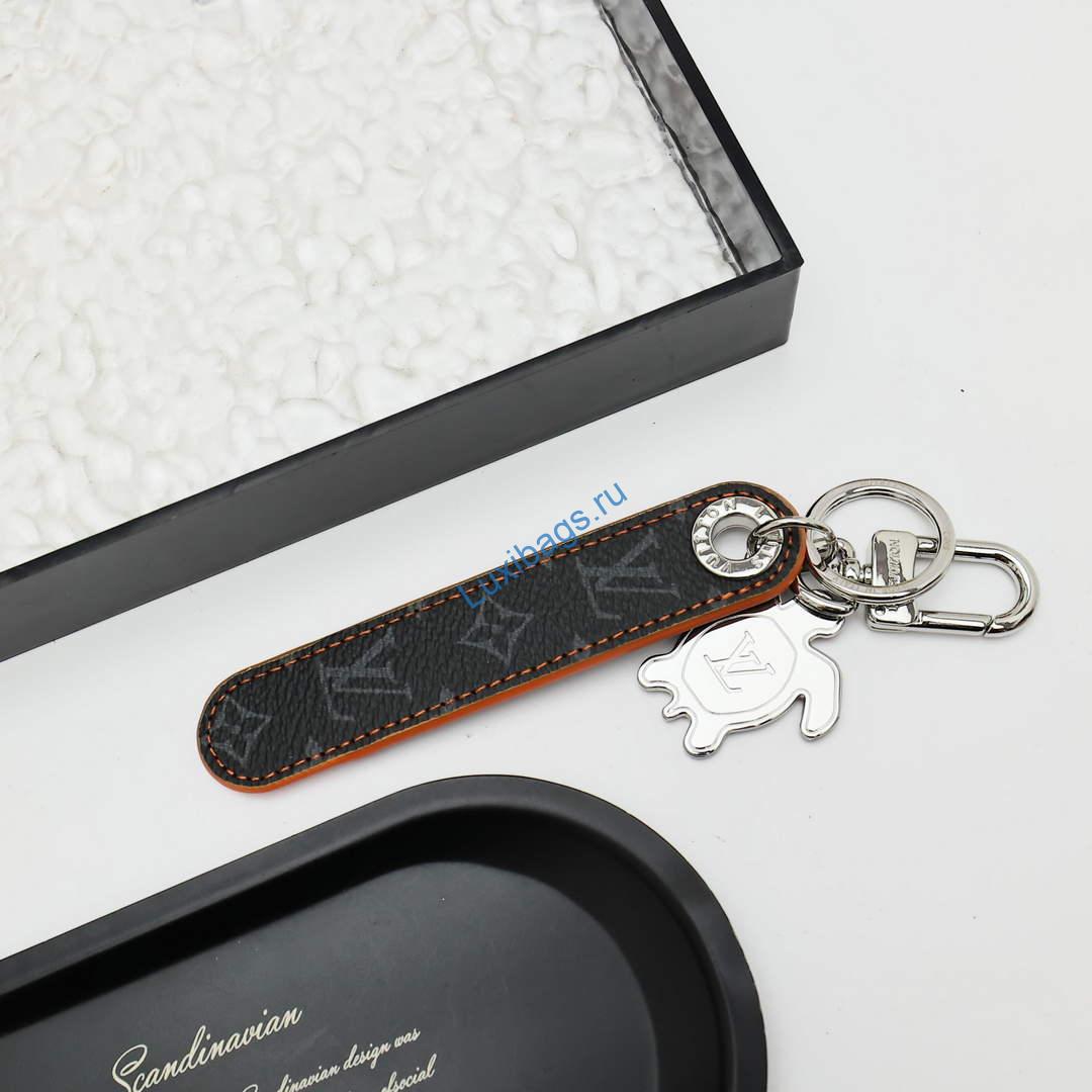 Louis Vuitton M02564 Dragonne Tab Key Holder and Bag Charm orange | louis vuitton m02564 dragonne tab key holder and bag charm orange 3