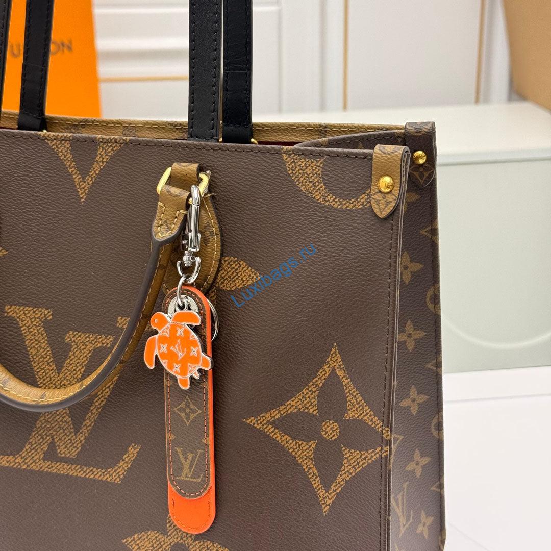 Louis Vuitton M02564 Dragonne Tab Key Holder and Bag Charm orange | louis vuitton m02564 dragonne tab key holder and bag charm orange 9