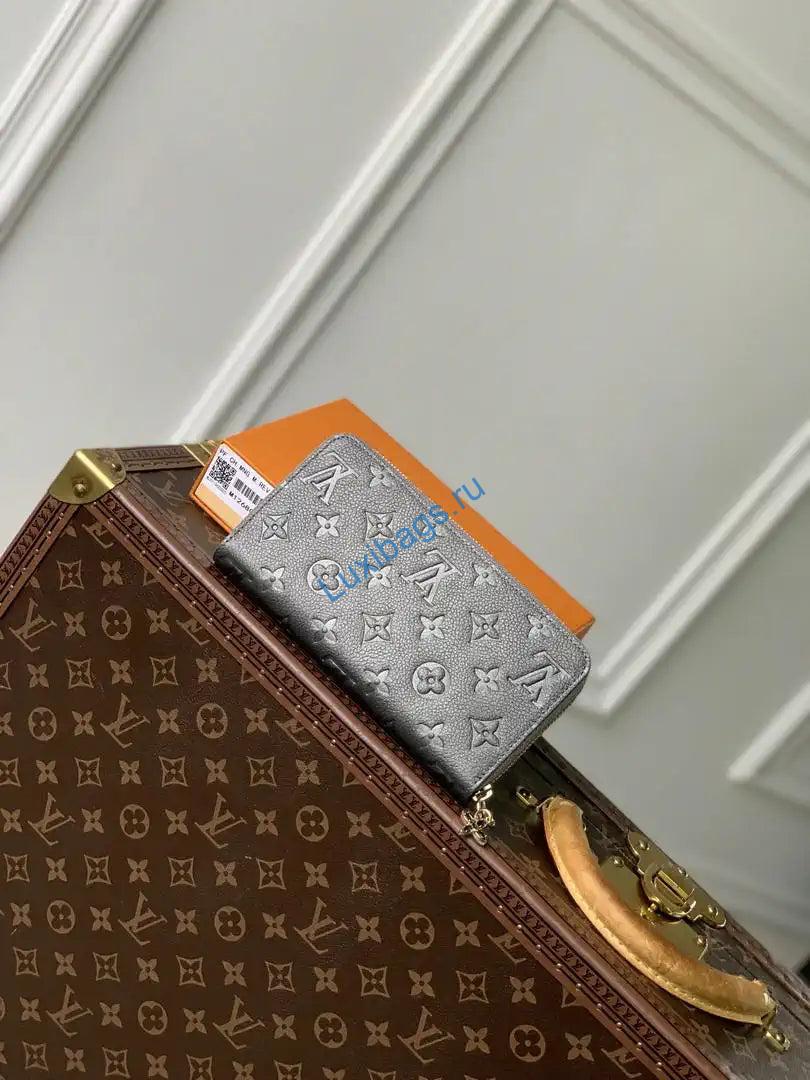 lv m12680 louis vuitton zipper wallet monogram empreinte pearl gray 1 LV M12680 Louis Vuitton Zipper Wallet Monogram Empreinte Pearl Gray | lv m12680 louis vuitton zipper wallet monogram empreinte gray 02