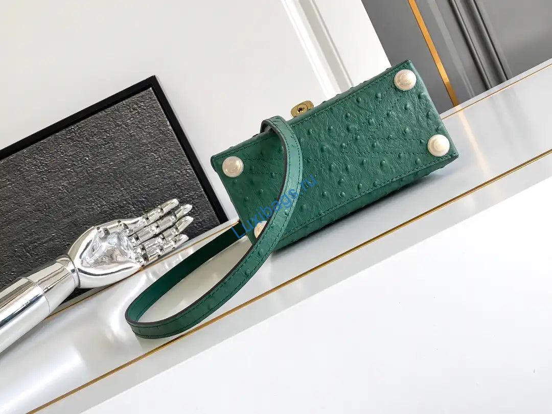 lv m87106 louis vuitton ostrich rose des vents mini green 3 LV M87106 Louis Vuitton Ostrich Rose Des Vents Mini Green | lv m87106 louis vuitton ostrich rose des vents mini purple 31