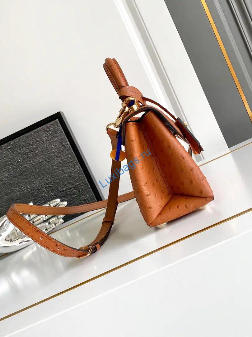 LV M87106 Louis Vuitton Ostrich Rose Des Vents Mini Brown | lv m87106 louis vuitton ostrich rose des vents mini purple 38