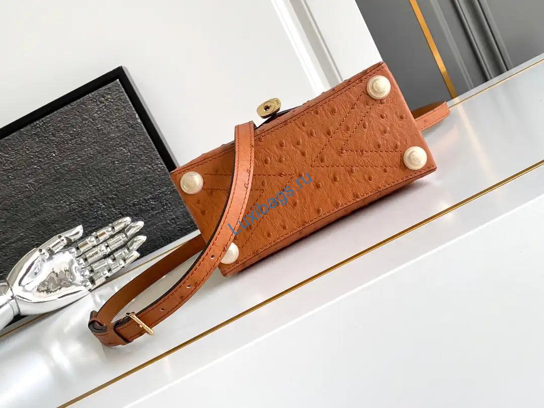 LV M87106 Louis Vuitton Ostrich Rose Des Vents Mini Brown | lv m87106 louis vuitton ostrich rose des vents mini purple 40