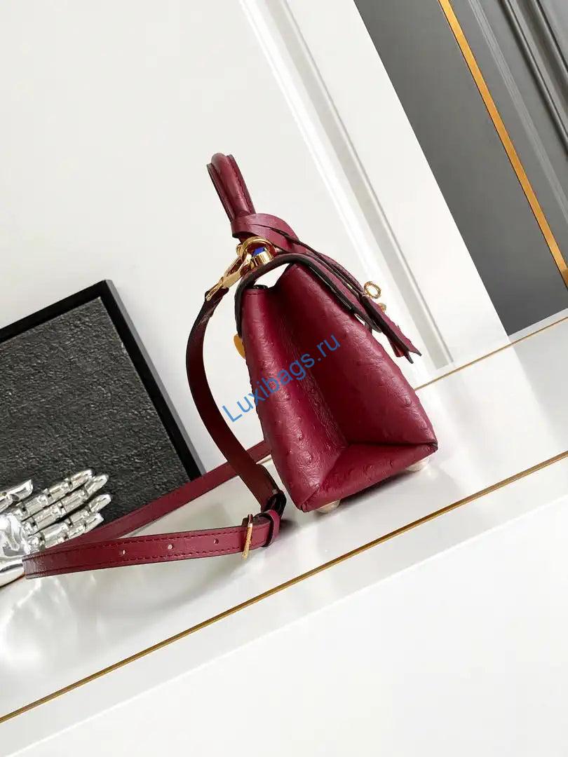 lv m87106 louis vuitton ostrich rose des vents mini wine red 1 LV M87106 Louis Vuitton Ostrich Rose Des Vents Mini Wine Red | lv m87106 louis vuitton ostrich rose des vents mini purple 56