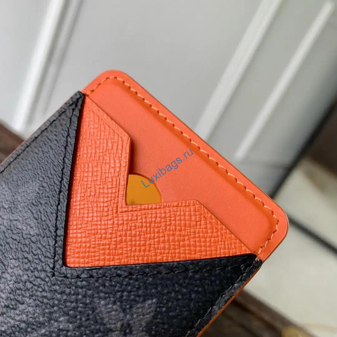 louis vuitton lv m26028 magnetic card holder black monogram orange 3 Louis Vuitton LV M26028 Magnetic Card Holder Black Monogram Orange | louis vuitton lv m26028 magnetic card holder black monogram orange 05