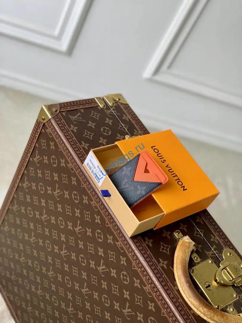 louis vuitton lv m26028 magnetic card holder black monogram orange 8 Louis Vuitton LV M26028 Magnetic Card Holder Black Monogram Orange | louis vuitton lv m26028 magnetic card holder black monogram orange 10