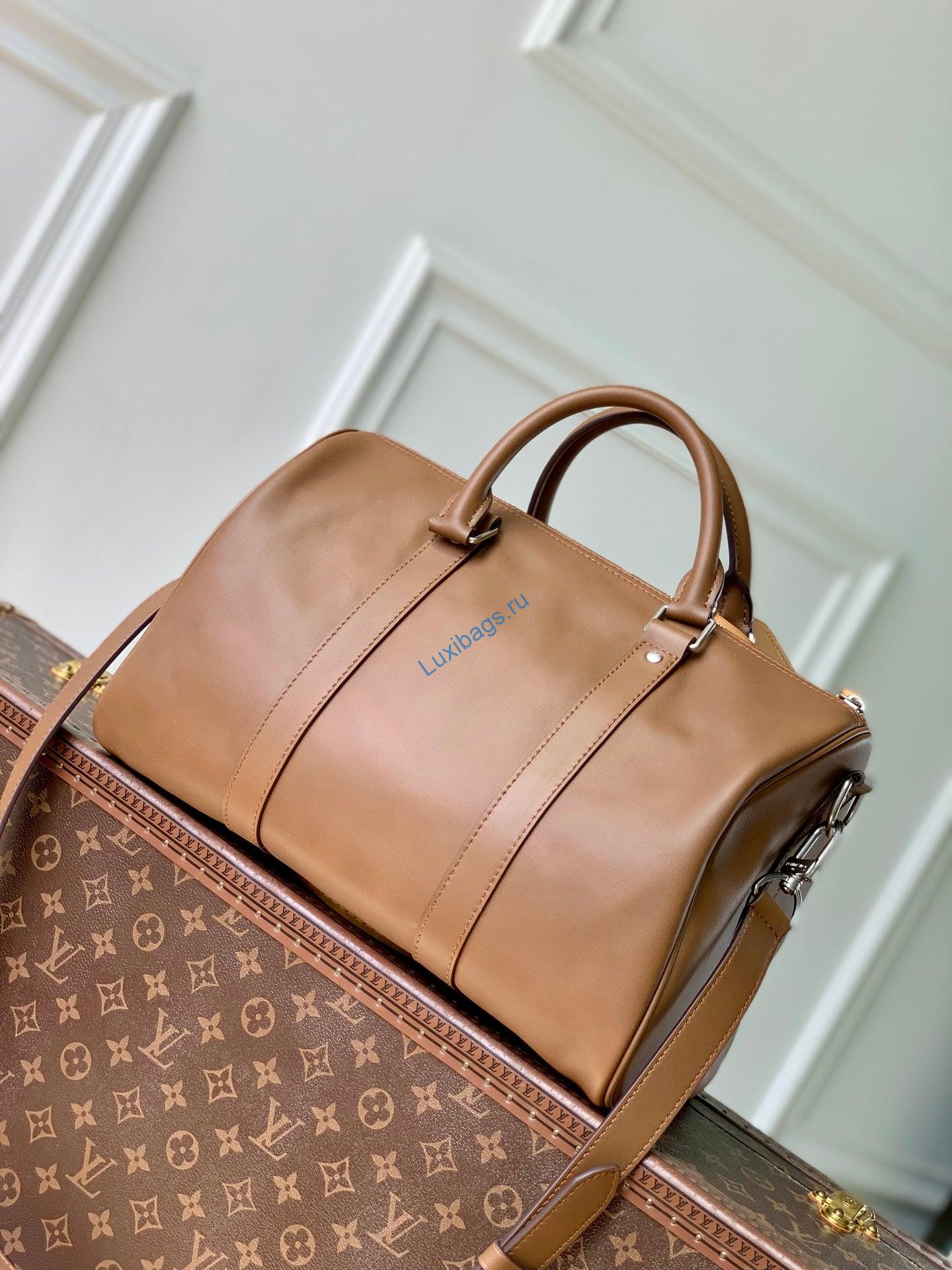 lv m28100 louis vuitton keepall cargo bandoulière 35 bag caramel 2 LV M28100 Louis Vuitton Keepall Cargo Bandoulière 35 Bag Caramel | lv m28100 louis vuitton keepall cargo bandouliere 35 bag caramel 3