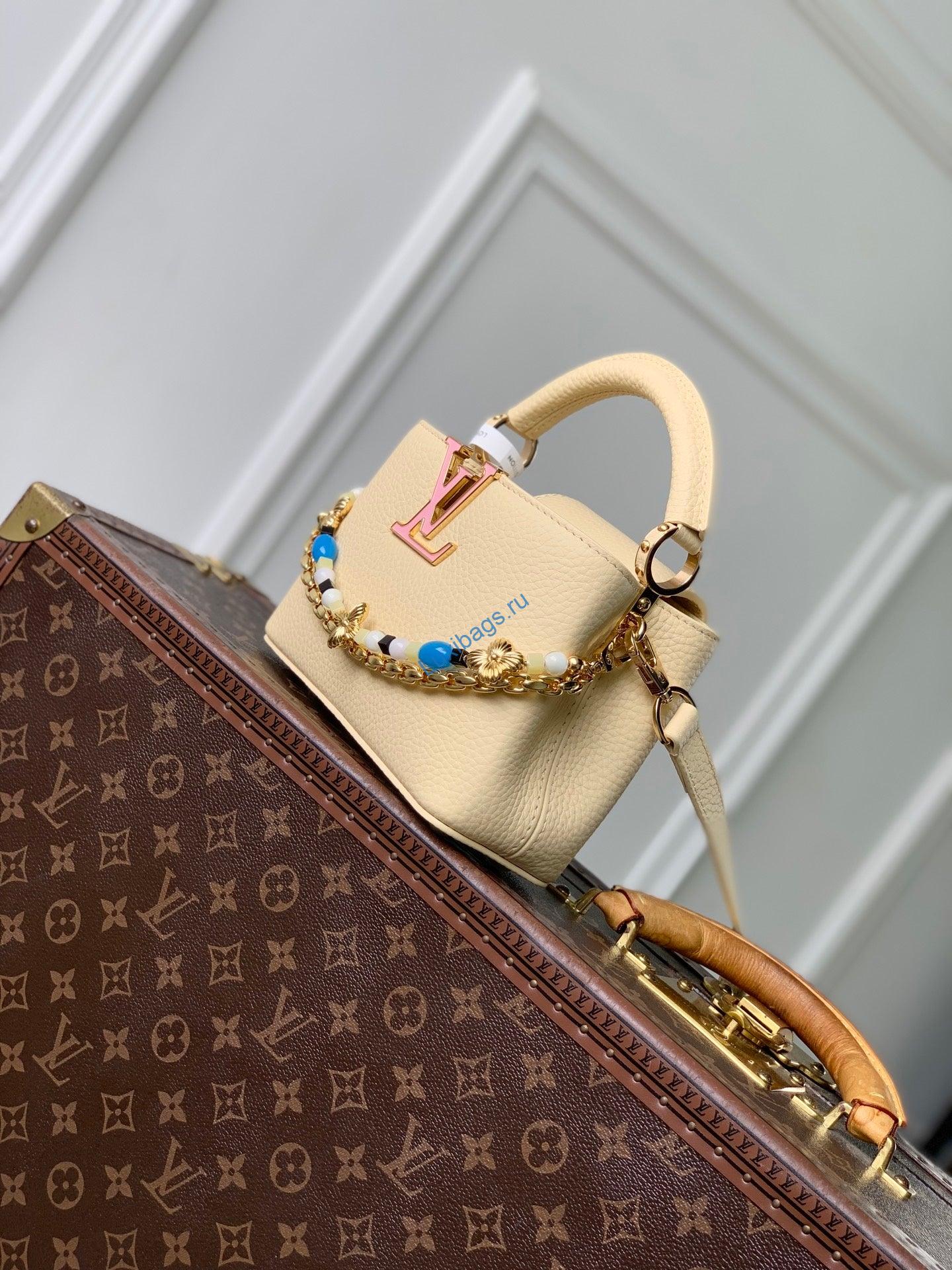 louis vuitton lv m29443 capucines east west mini bag apricot 1 Louis Vuitton LV M29443 Capucines East West Mini Bag Apricot | louis vuitton lv m29443 capucines east west mini bag apricot 2