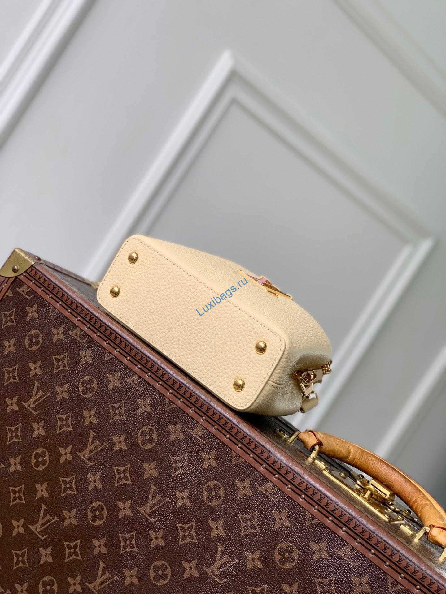 louis vuitton lv m29443 capucines east west mini bag apricot 2 Louis Vuitton LV M29443 Capucines East West Mini Bag Apricot | louis vuitton lv m29443 capucines east west mini bag apricot 3