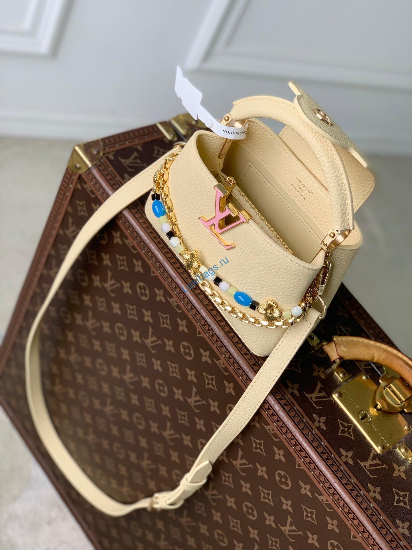 louis vuitton lv m29443 capucines east west mini bag apricot 8 Louis Vuitton LV M29443 Capucines East West Mini Bag Apricot | louis vuitton lv m29443 capucines east west mini bag apricot 9