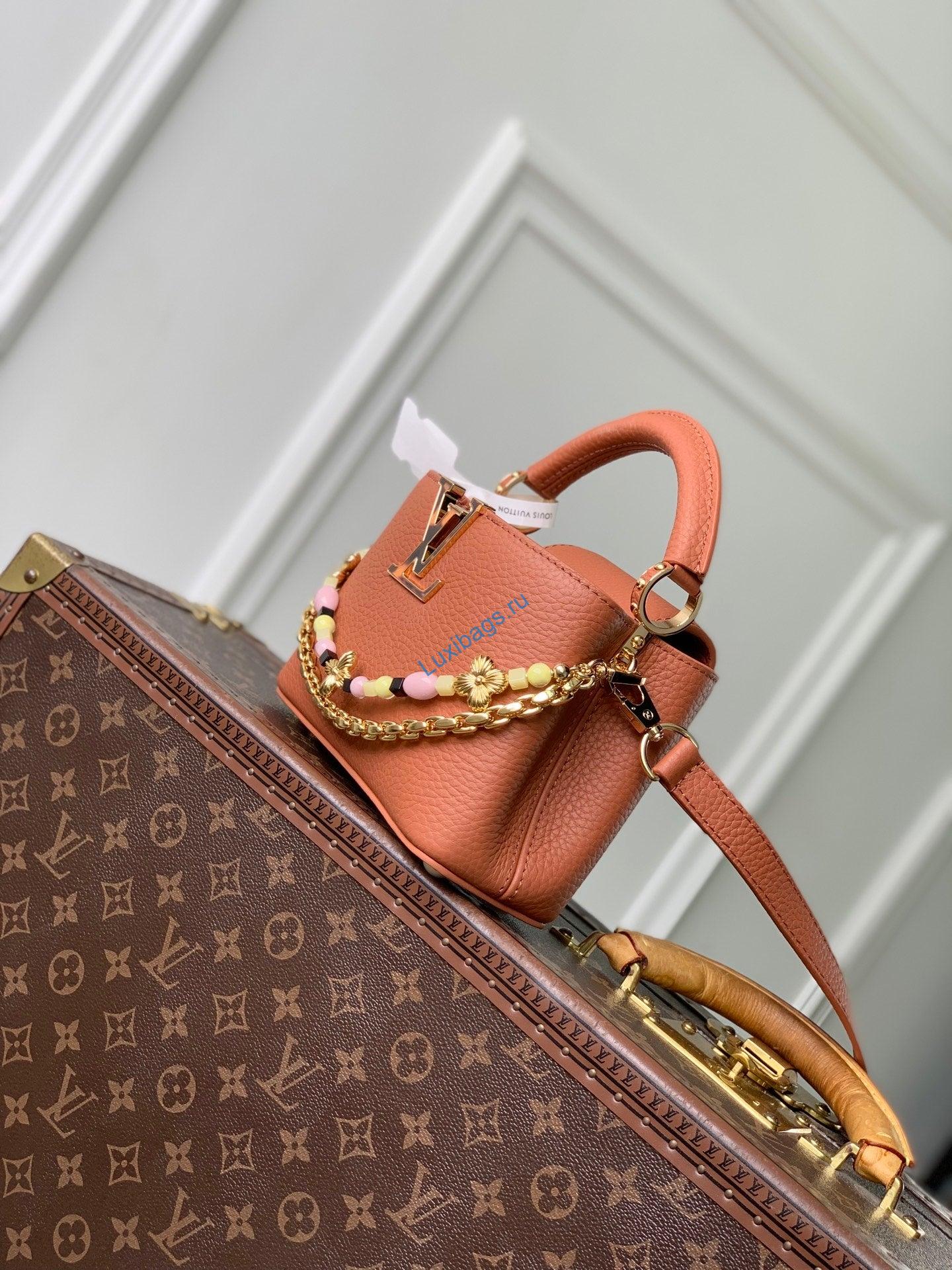louis vuitton lv m29443 capucines east west mini bag brown 1 Louis Vuitton LV M29443 Capucines East West Mini Bag Brown | louis vuitton lv m29443 capucines east west mini bag brown 2